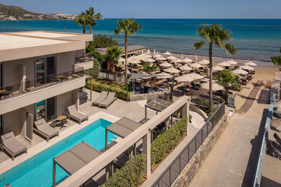 Aerial view of Riviera beachfront restaurant, pool and private beach in Stalida, Crete